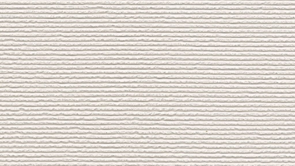 white stone panel with coarse horizontal veining